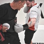 two boxing adult members sparring training sparring